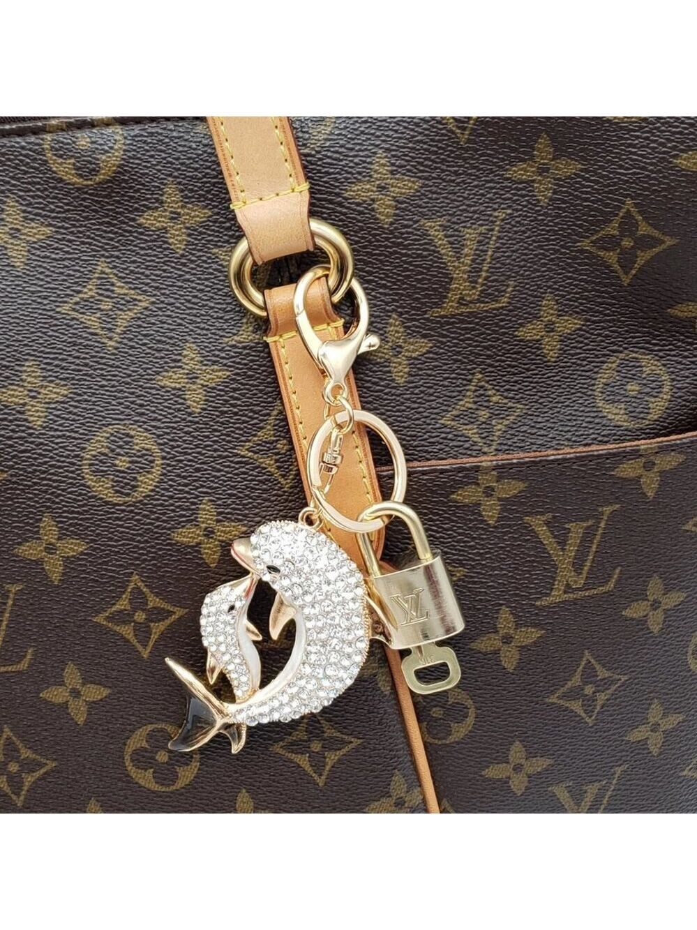Authentic Louis Vuitton Lock & Key with unbranded Rhinstone Dolphine Bagcharm